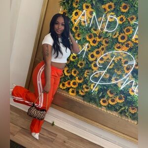 Women's Orange Track Joggers with White Side Stripes